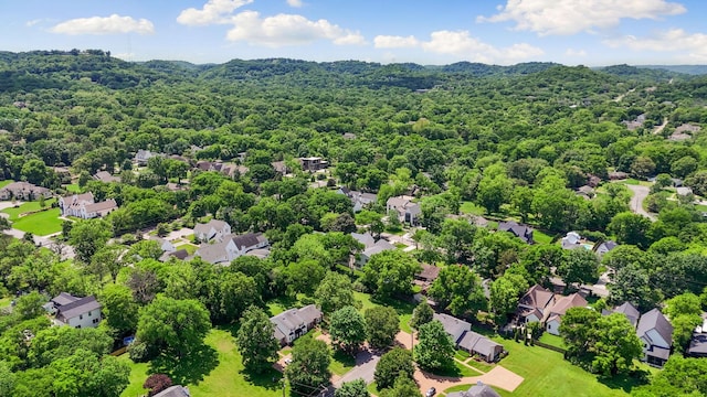 aerial view of residential area with a forest