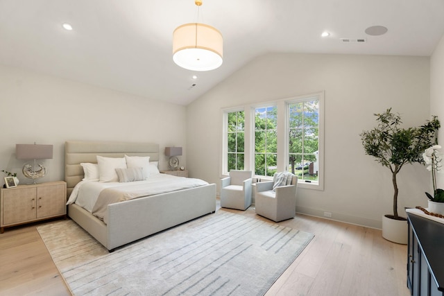 bedroom with lofted ceiling, light wood-type flooring, baseboards, and recessed lighting
