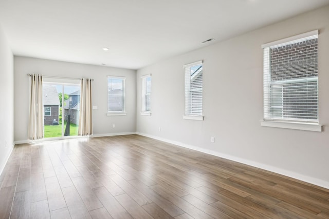 440 Golden Meadow Ln, Hendersonville, TN 37075 - empty room featuring baseboards, plenty of natural light, wood finished floors, and recessed lighting