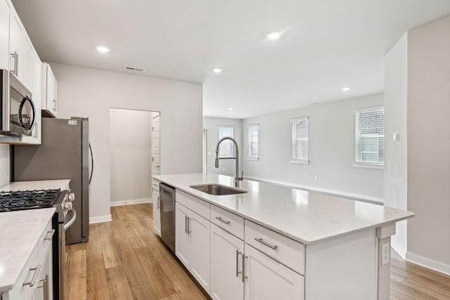 440 Golden Meadow Ln, Hendersonville, TN 37075 - kitchen featuring a sink, stainless steel appliances, baseboards, white cabinets, and recessed lighting