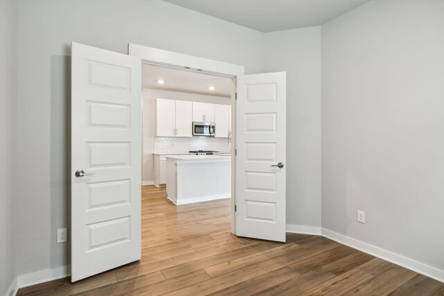 440 Golden Meadow Ln, Hendersonville, TN 37075 - empty room with light wood finished floors, baseboards, and recessed lighting