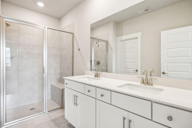 440 Golden Meadow Ln, Hendersonville, TN 37075 - bathroom with a stall shower, double vanity, tile patterned flooring, and recessed lighting