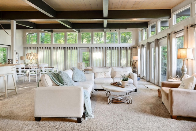 698 Crestview Dr, Sparta, TN 38583 - carpeted living room with wooden ceiling with exposed beams