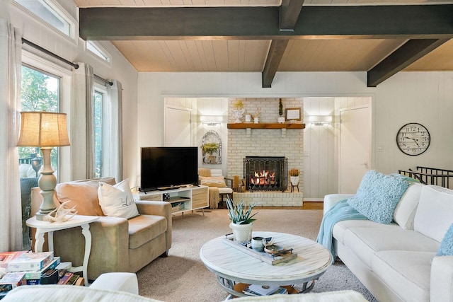 698 Crestview Dr, Sparta, TN 38583 - living area featuring carpet, a fireplace, and wooden ceiling with exposed beams