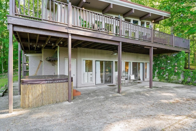 698 Crestview Dr, Sparta, TN 38583 - view of patio / terrace with a hot tub, a ceiling fan, and a deck