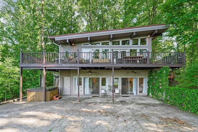 698 Crestview Dr, Sparta, TN 38583 - back of property with a hot tub, ceiling fan, a patio area, and a deck
