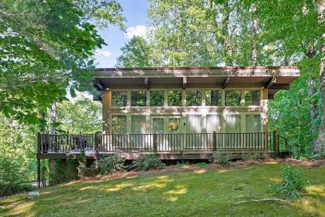 698 Crestview Dr, Sparta, TN 38583 - back of house featuring a wooden deck and a lawn