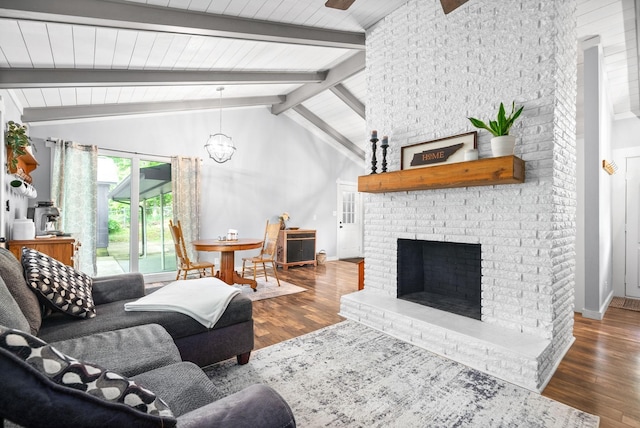 living room featuring a chandelier, wood finished floors, baseboards, a fireplace, and wooden ceiling