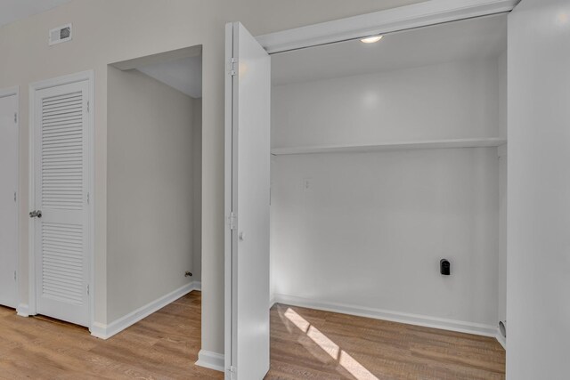 2732 Linmar Ave, Nashville, TN 37215 - clothes washing area featuring wood finished floors and baseboards