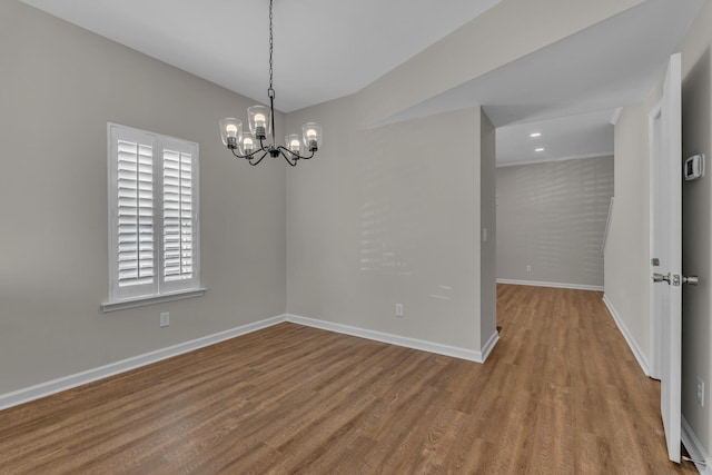 2732 Linmar Ave, Nashville, TN 37215 - unfurnished room with wood finished floors, a chandelier, and baseboards