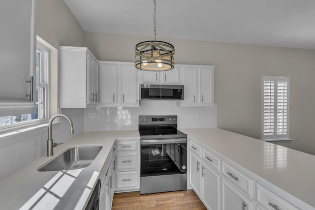 2732 Linmar Ave, Nashville, TN 37215 - kitchen featuring stainless steel appliances, a sink, plenty of natural light, and white cabinetry