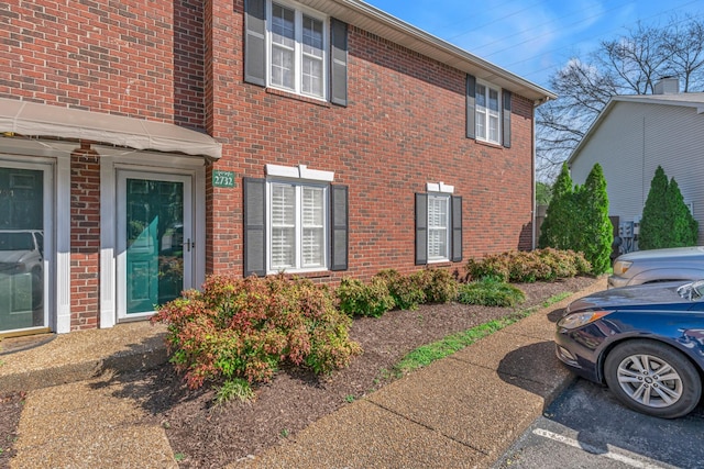 2732 Linmar Ave, Nashville, TN 37215 - view of side of home featuring brick siding and uncovered parking