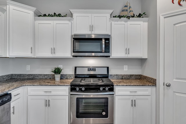 400 Tonalist Way, Smyrna, TN 37167 - kitchen with stainless steel appliances, white cabinetry, and stone counters