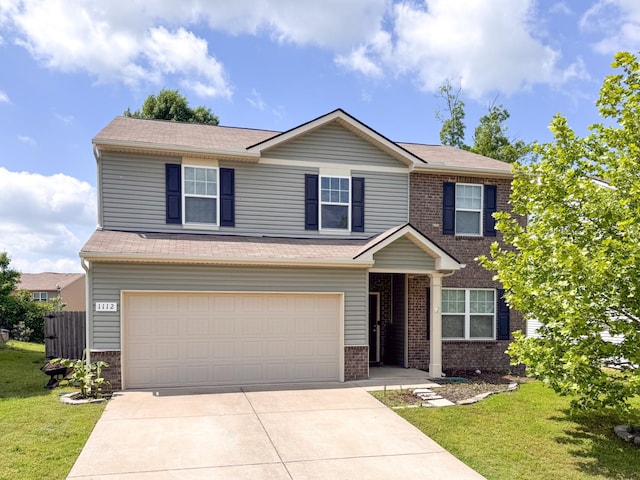 1112 Pickett Rd, Lebanon, TN 37087 - view of front of home with brick siding, an attached garage, concrete driveway, and a shingled roof