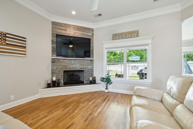 905 W Sagefield Dr, Smyrna, TN 37167 - living area featuring ceiling fan, baseboards, a large fireplace, crown molding, and wood finished floors