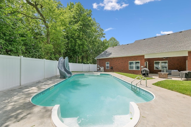 905 W Sagefield Dr, Smyrna, TN 37167 - view of swimming pool featuring a water slide, a patio, a fenced backyard, an outdoor hangout area, and grilling area