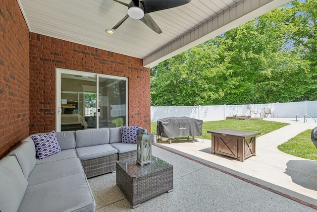 905 W Sagefield Dr, Smyrna, TN 37167 - view of patio with grilling area, an outdoor living space with a fire pit, a fenced backyard, and a ceiling fan
