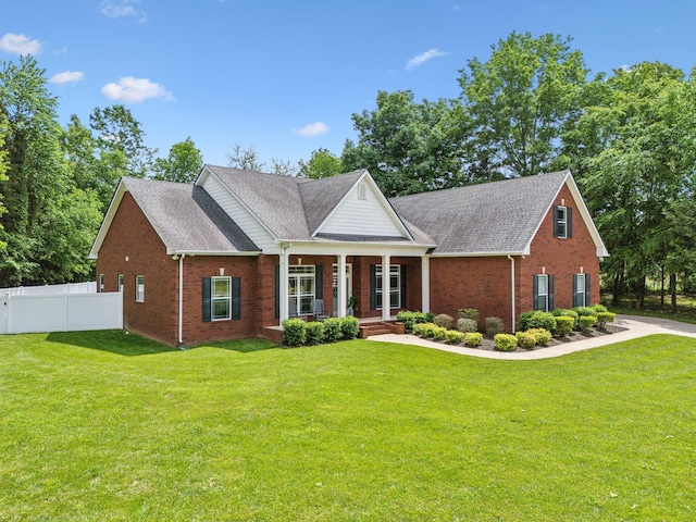 905 W Sagefield Dr, Smyrna, TN 37167 - view of front of home featuring brick siding, a porch, and a shingled roof