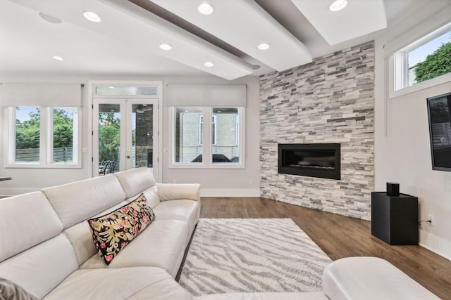 1211A Sigler St, Nashville, TN 37203 - living area featuring a tile fireplace, wood finished floors, recessed lighting, and french doors