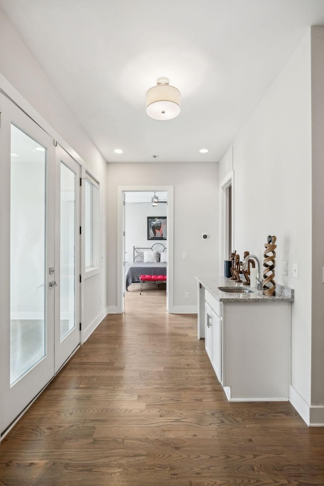 1211A Sigler St, Nashville, TN 37203 - hall featuring a sink, wood finished floors, baseboards, and french doors