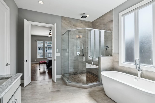 1211A Sigler St, Nashville, TN 37203 - bathroom with vanity, a stall shower, a freestanding bath, recessed lighting, and ensuite bathroom