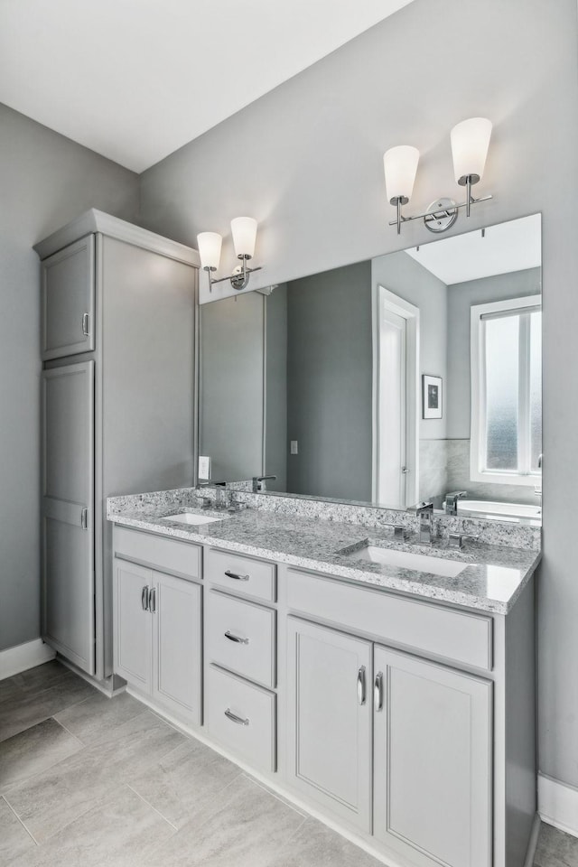 1211A Sigler St, Nashville, TN 37203 - bathroom with double vanity and baseboards
