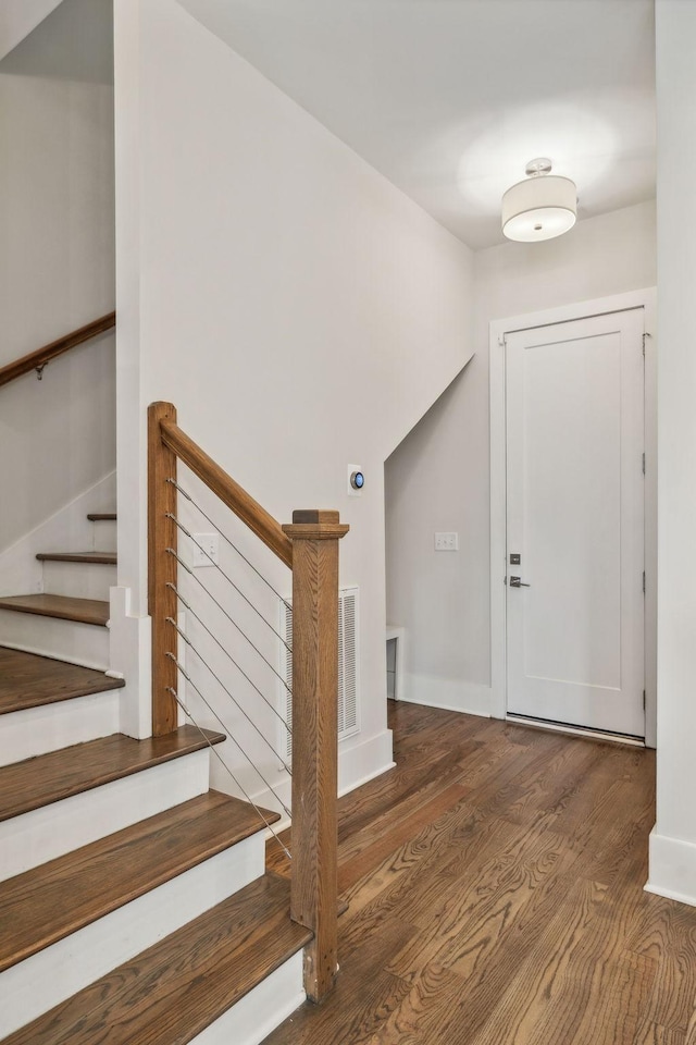 1211A Sigler St, Nashville, TN 37203 - entrance foyer featuring wood finished floors, stairway, and baseboards