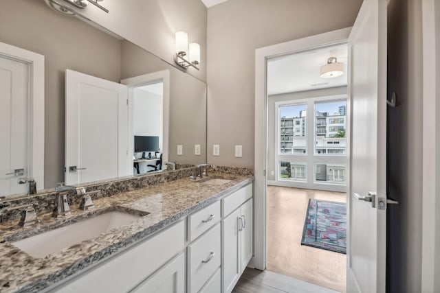 1211A Sigler St, Nashville, TN 37203 - bathroom featuring double vanity and wood finished floors