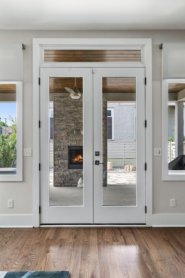 1211A Sigler St, Nashville, TN 37203 - doorway to outside with french doors, baseboards, and wood finished floors