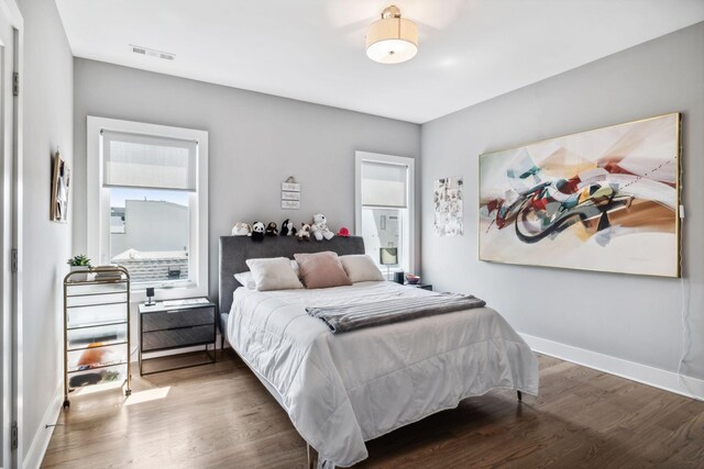 1211A Sigler St, Nashville, TN 37203 - bedroom featuring wood finished floors and baseboards