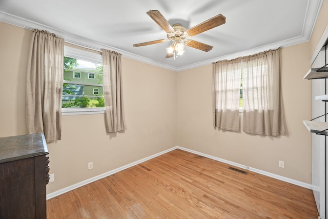 103 Walnut Dr, Carthage, TN 37030 - unfurnished room with light wood finished floors, baseboards, ceiling fan, and crown molding