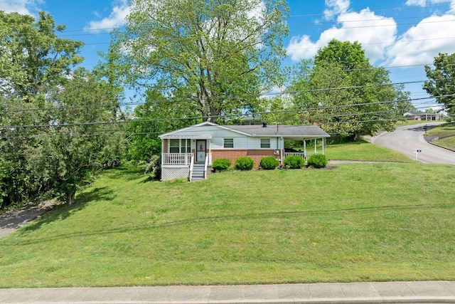 103 Walnut Dr, Carthage, TN 37030 - view of front of home featuring a front lawn and brick siding