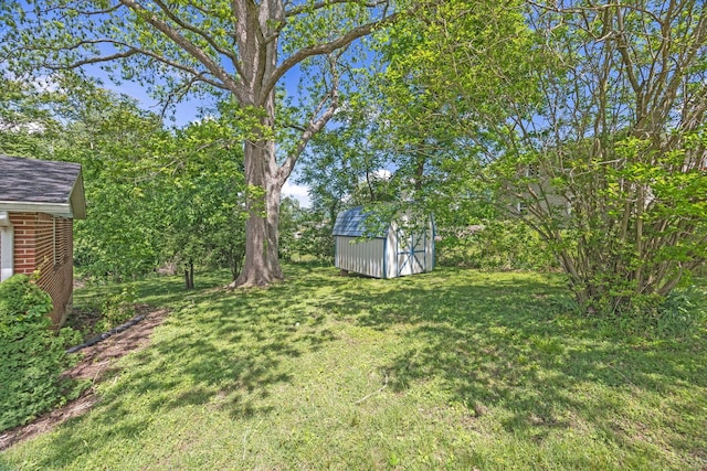 103 Walnut Dr, Carthage, TN 37030 - view of grassy yard with a shed and an outbuilding