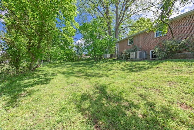103 Walnut Dr, Carthage, TN 37030 - view of green lawn featuring central AC unit