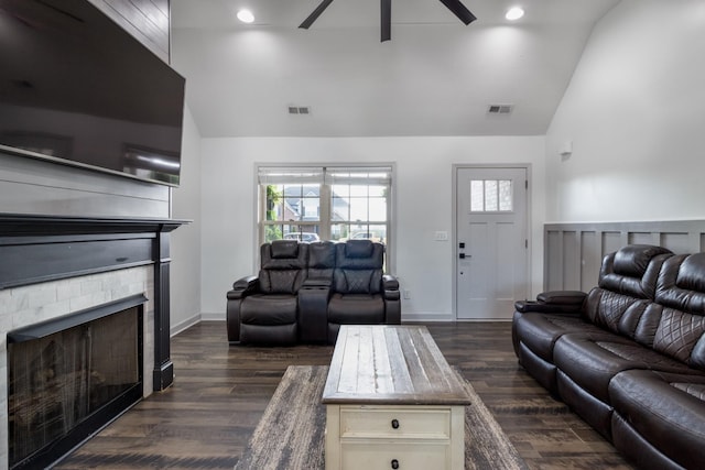 7919 Natahna Ct, Murfreesboro, TN 37127 - living room featuring vaulted ceiling, a ceiling fan, a stone fireplace, dark wood finished floors, and baseboards