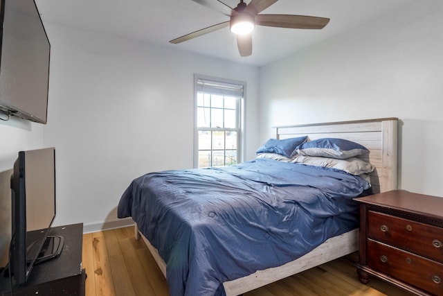 7919 Natahna Ct, Murfreesboro, TN 37127 - bedroom with wood finished floors, ceiling fan, and baseboards