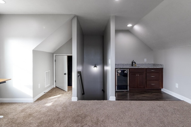 7919 Natahna Ct, Murfreesboro, TN 37127 - indoor bar with beverage cooler, dark colored carpet, lofted ceiling, recessed lighting, and baseboards