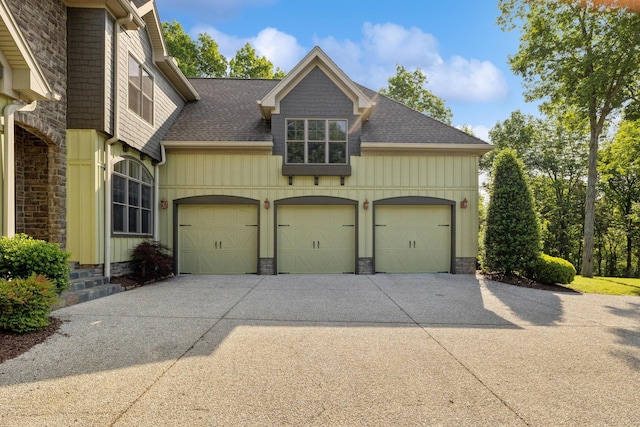 150 Valley Vista Dr, Carthage, TN 37030 - view of side of home with driveway, a garage, and a shingled roof