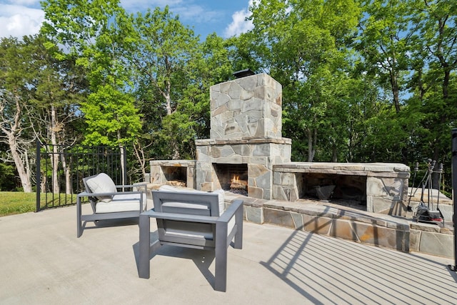 150 Valley Vista Dr, Carthage, TN 37030 - view of patio / terrace featuring an outdoor stone fireplace and view of scattered trees