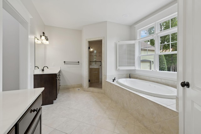 150 Valley Vista Dr, Carthage, TN 37030 - bathroom with vanity, a bath, tile patterned flooring, and a stall shower