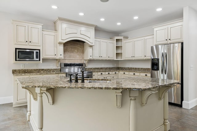 150 Valley Vista Dr, Carthage, TN 37030 - kitchen with stainless steel appliances, baseboards, open shelves, a breakfast bar, and recessed lighting