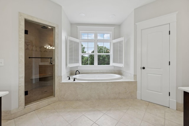 150 Valley Vista Dr, Carthage, TN 37030 - full bathroom featuring a garden tub, vanity, a shower stall, and tile patterned floors