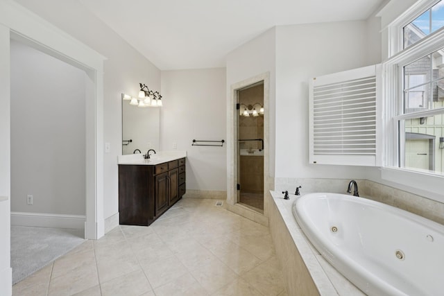 150 Valley Vista Dr, Carthage, TN 37030 - bathroom with vanity, a whirlpool tub, a shower stall, tile patterned floors, and baseboards