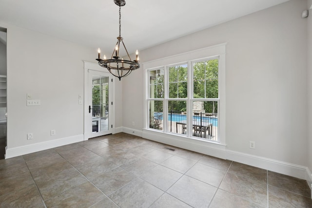 150 Valley Vista Dr, Carthage, TN 37030 - unfurnished dining area featuring a chandelier, tile patterned floors, and baseboards