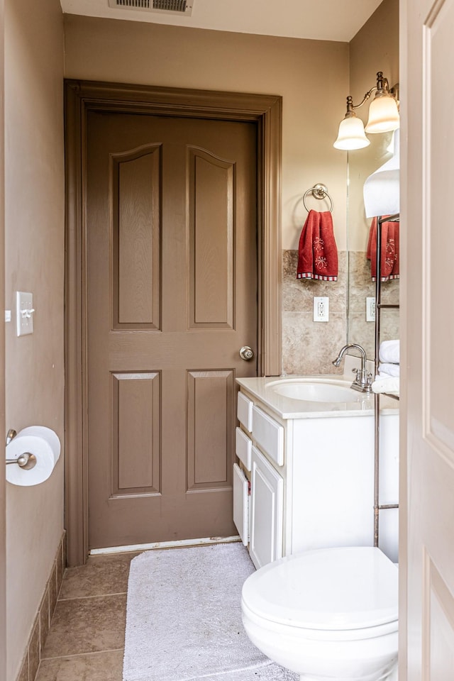 bathroom featuring vanity and tile patterned flooring