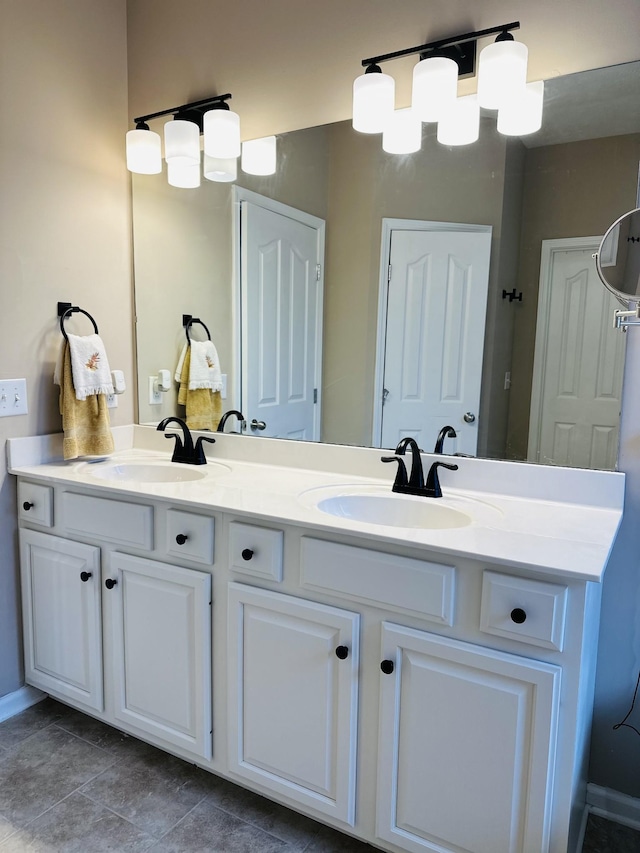 full bathroom with double vanity and tile patterned floors