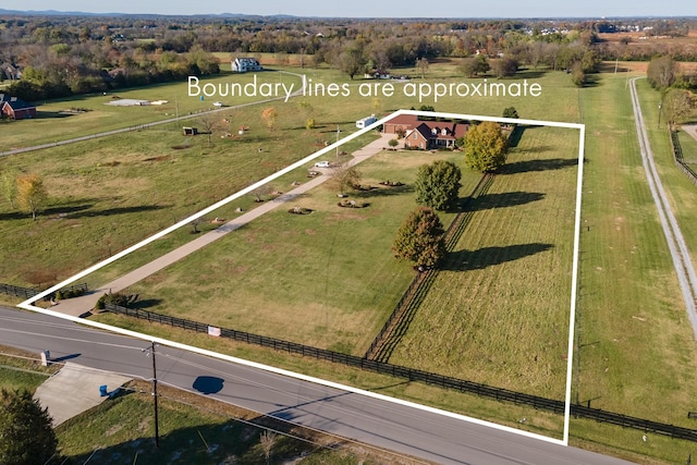 aerial view of sparsely populated area with property parcel outlined