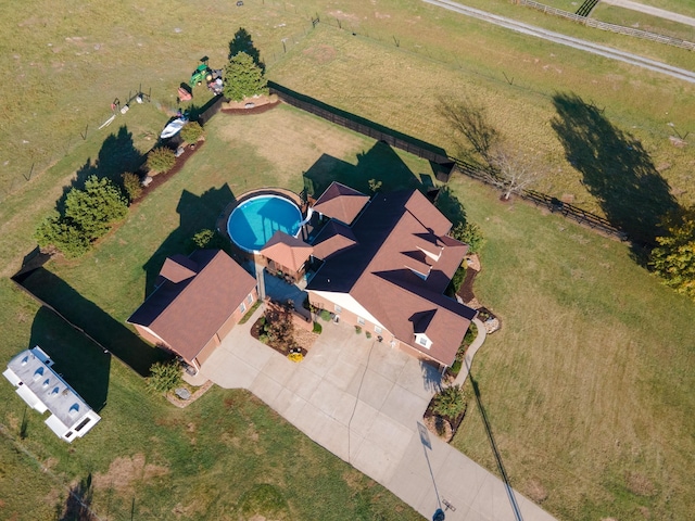 view of subject property featuring a pool area