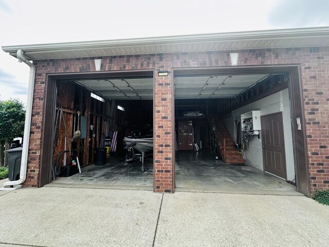 garage with concrete driveway