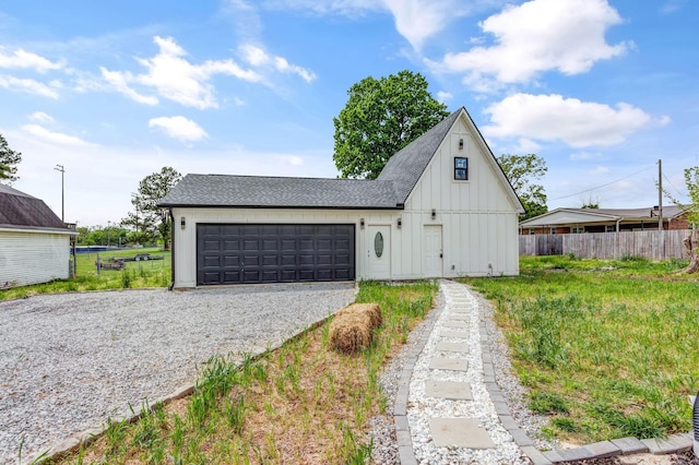 107 Shady St, Summertown, TN 38483 - garage featuring gravel driveway and fence
